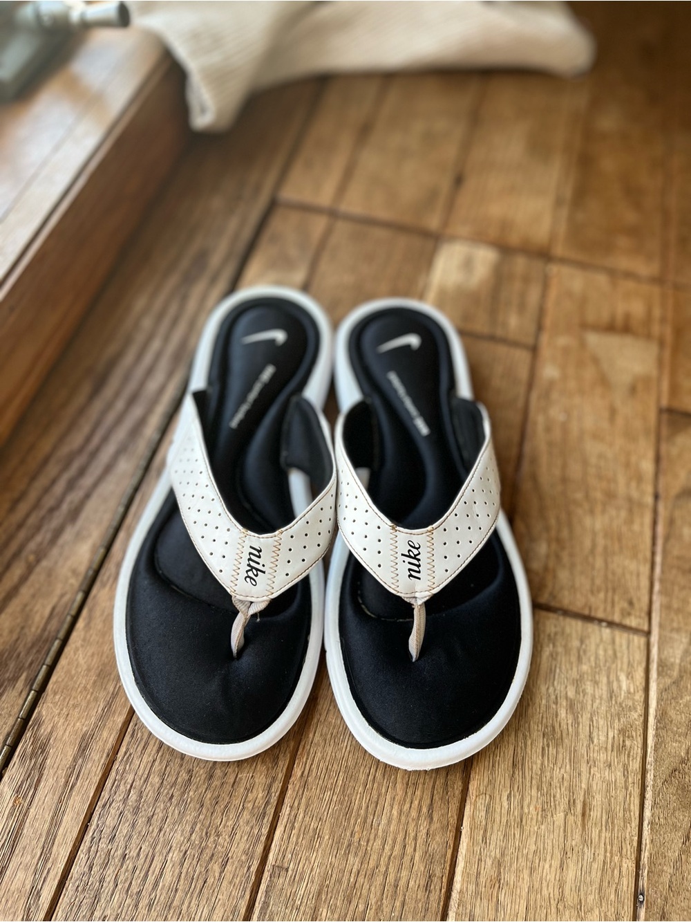 Nike Women's Black Footbed White Perforated Thong Sandals
